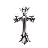 an ornate silver cross on a black background