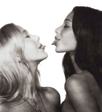 a black and white photo of two women kissing each other